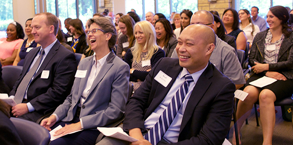 Pictured:  Class 12 of the Health Leadership Program, laughing at their graduation